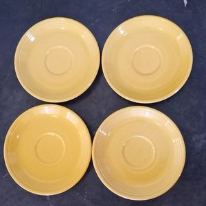 4 Yellow Fiesta ware saucers